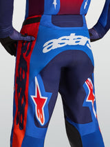 Alpinestars Racer Hunt Pants, men's blue and red motocross pants with white astars branding and star graphics.