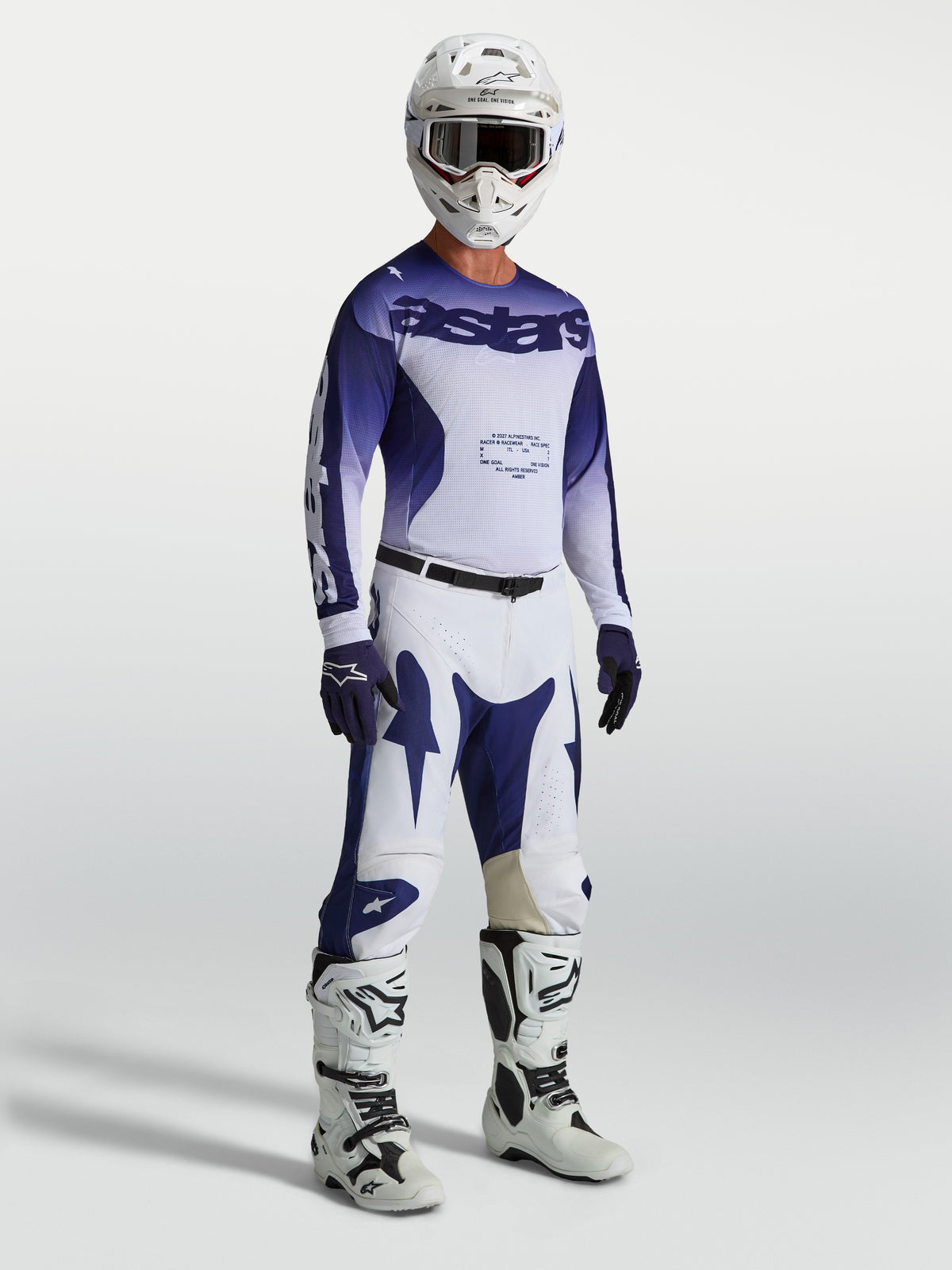 Alpinestars Racer Air Amber Pants, blue and white motocross pants on-model with matching jersey, boots, and helmet.