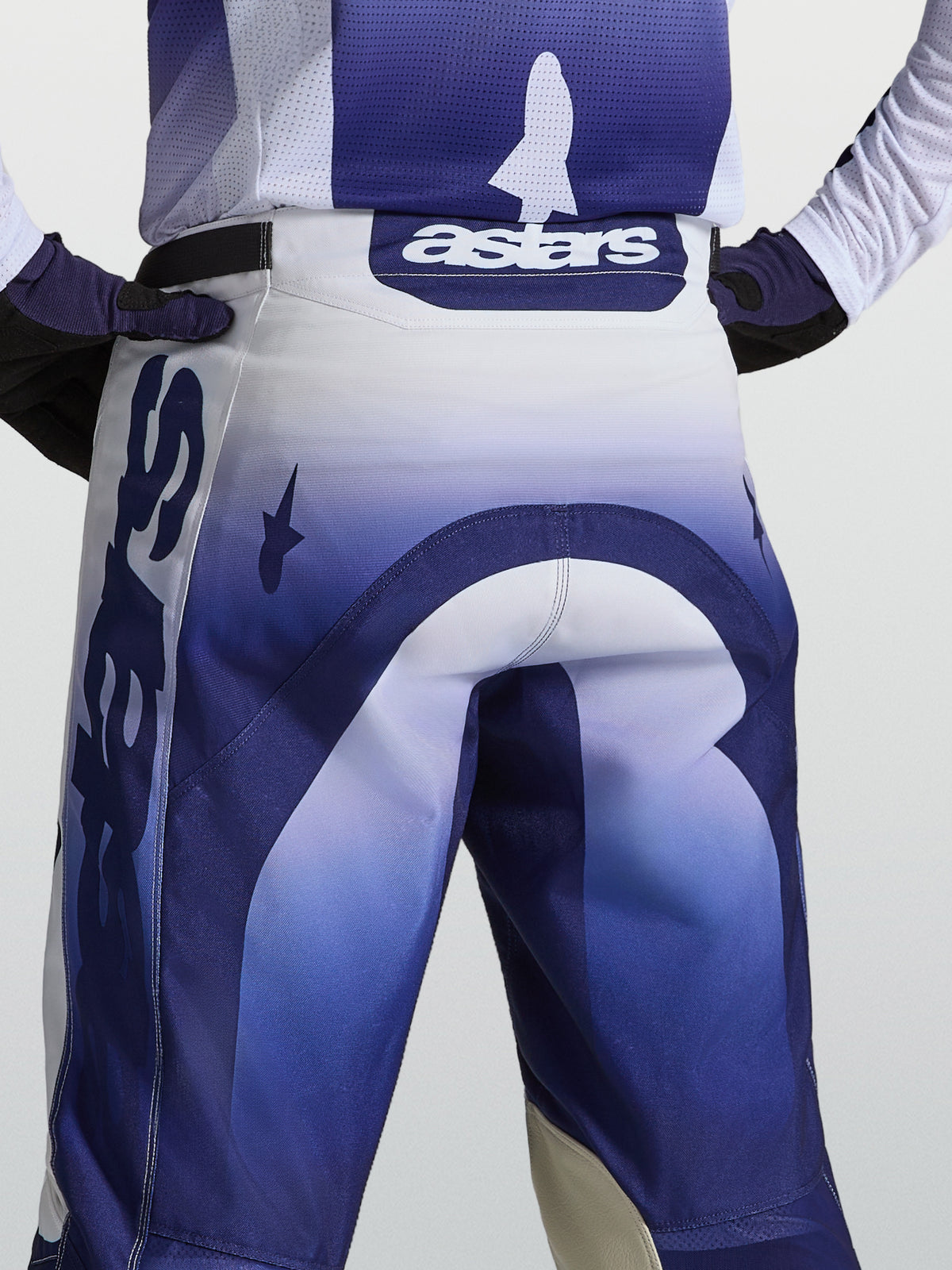 Alpinestars Racer Air Amber Motocross Pants in Blue and White, rear view featuring the astars logo on the waist.