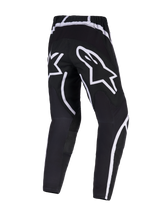 Alpinestars 2026 Fluid Apex Pants, Motocross Pants, Black and White, rear view showing large white star branding on the seat, ergonomic design with curved white accents, durable 600D polyfabric for off-road performance.