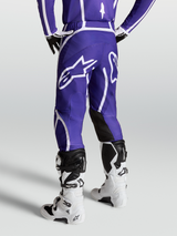 Alpinestars Fluid Apex V2 Pants, Men's Motocross Pants in Deep Blue and White, featuring a large rear star logo and ergonomic 3D cut.