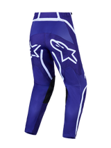 Alpinestars Fluid Apex V2 Motocross Pants for Men, Deep Blue and White, with pre-curved legs and bold star logo graphics.