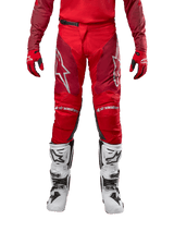 Alpinestars 2024 Racer Hoen Pants, Motocross Pants, Mars Red Burgundy, front view featuring silver Alpinestars logos and knee branding, worn with matching red jersey, red and black gloves, and white off-road boots