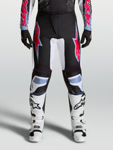 Alpinestars Fluid Drag Pants, Men's Black and Red Motocross Pants with durable 600D polyfabric and reinforced stretch panels.