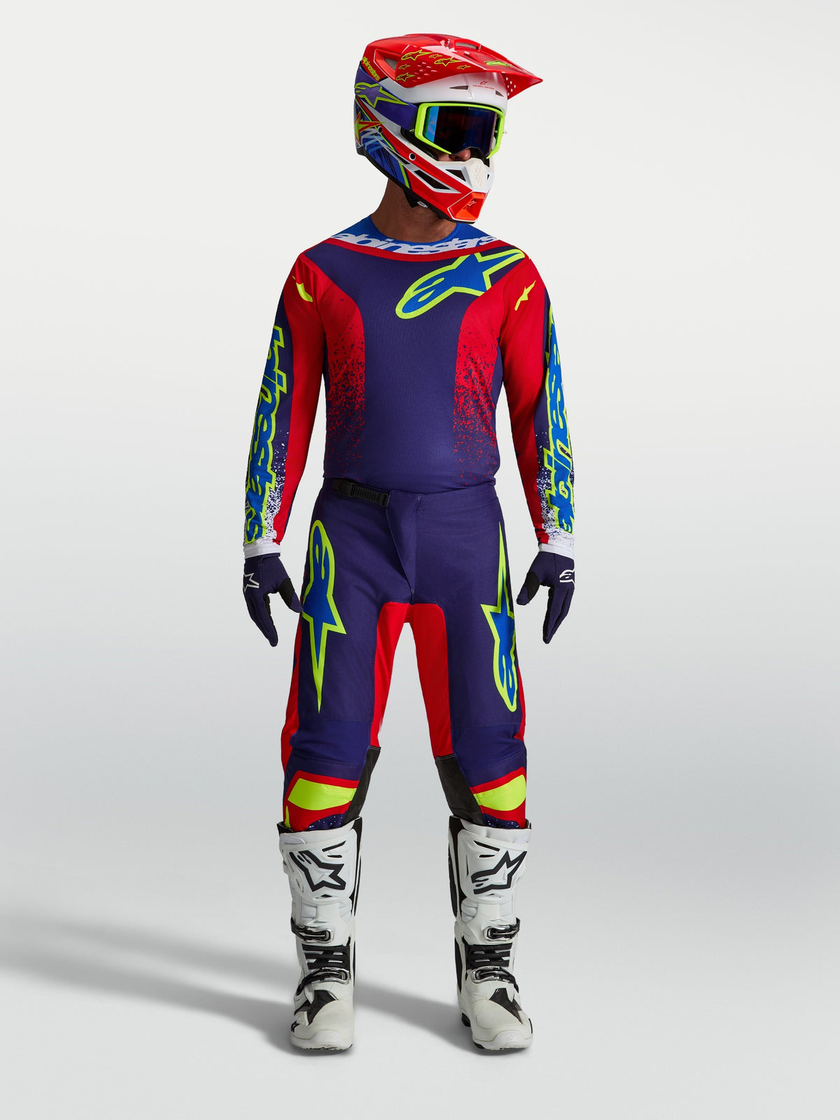 Alpinestars Fluid Drag Pants AND 2027 Fluid Drag Gear Set, Men's Motocross Outfit in Blue Navy and Fire Red with white boots.