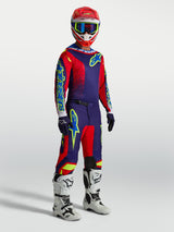 Alpinestars Men's Fluid Drag Gear Set, navy blue and red motocross outfit with white racing boots.