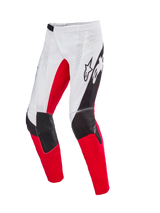 Alpinestars Limited Edition Techstar Deep Pants, Motocross Pants, White Black and High Red, featuring laser-perforated ventilation, 3D Babel knee construction with reinforced panels, and bold Alpinestars branding on the thighs, designed for professional off-road performance.
