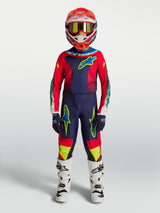 Alpinestars Youth Fluid Drag Pants, Blue Navy and Fire Red Motocross Pants, youth gear in 600D polyfabric shown on-model.