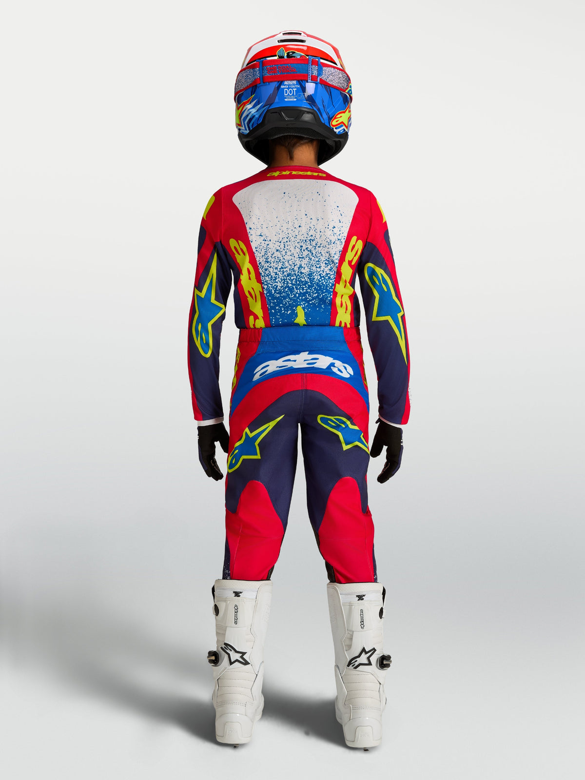 Alpinestars Youth Fluid Drag Pants, Motocross Gear Set, Blue and Red, full kit rear view with matching jersey and boots.