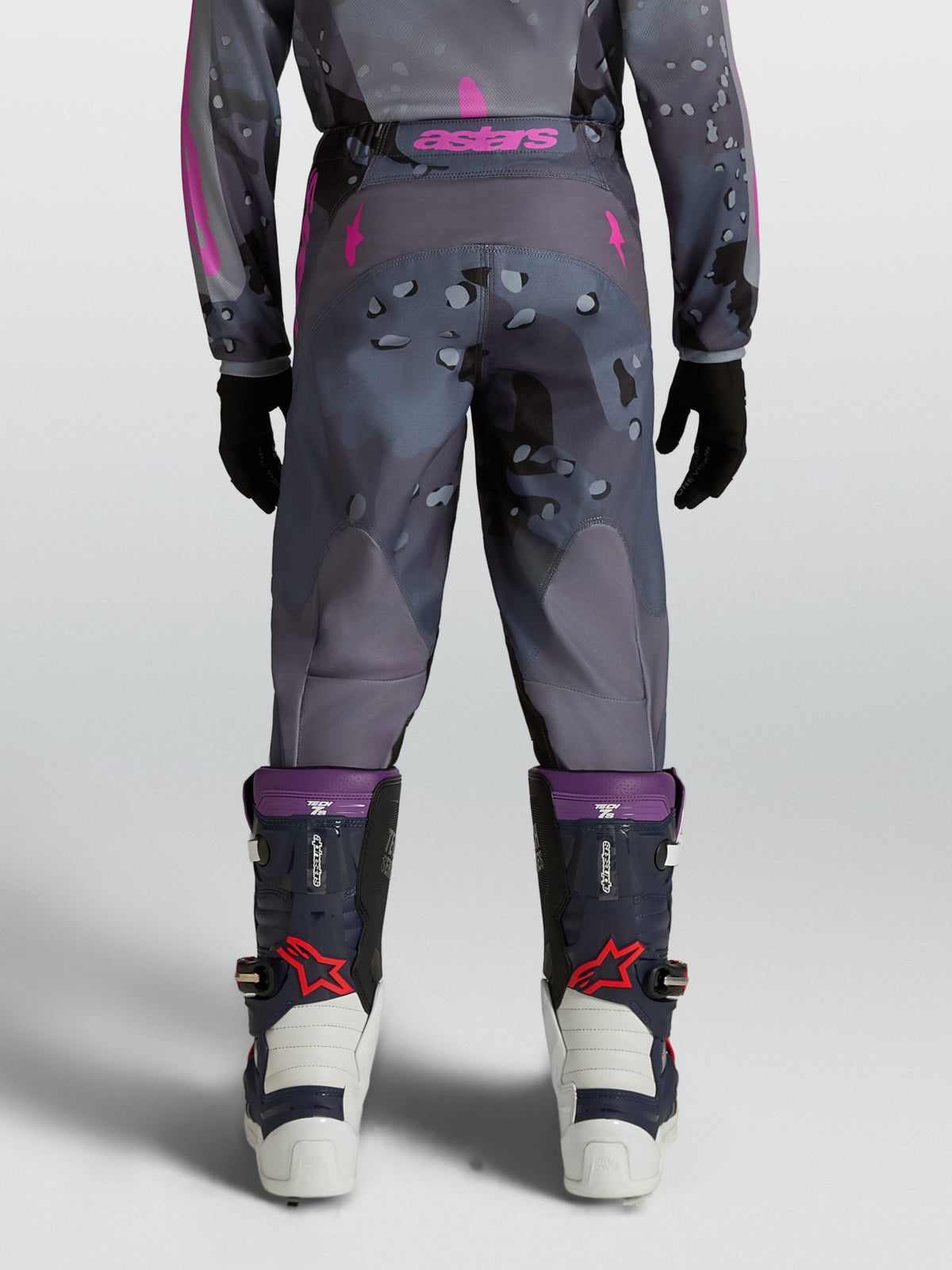 Alpinestars Youth Fluid Lone Pants for motocross, Gray Camo and Purple textile, rear view on model.