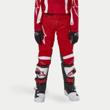 Alpinestars Youth 2024 Racer Lurv Pants, Mars Red and White motocross gear with pre-curved legs for racing performance.