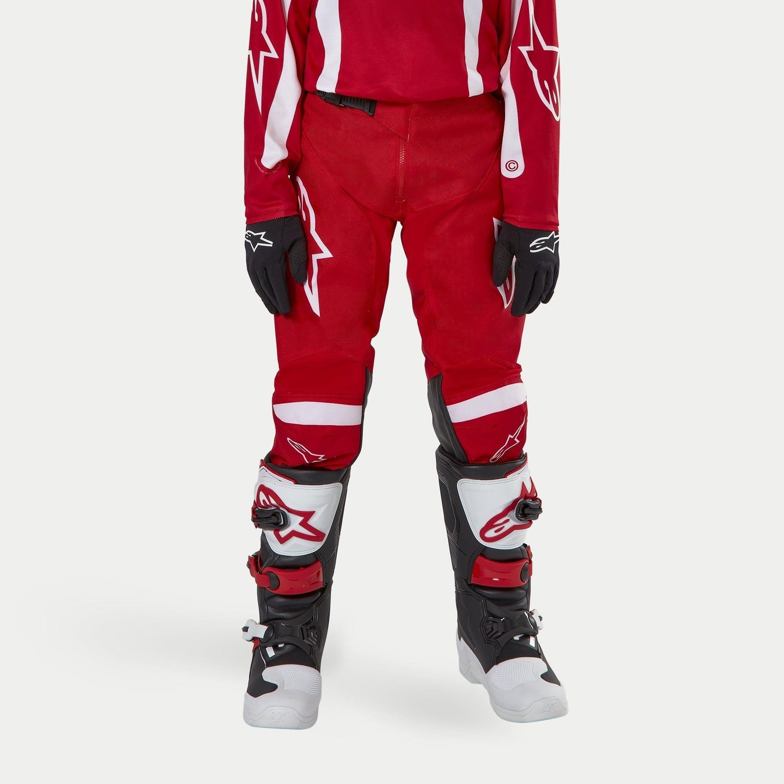Alpinestars Youth 2024 Racer Lurv Pants, Mars Red and White motocross gear with pre-curved legs for racing performance.