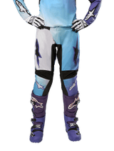 Alpinestars Women's Stella 2024 Fluid Pants, White and Turquoise motocross gear with purple accents for off-road performance.