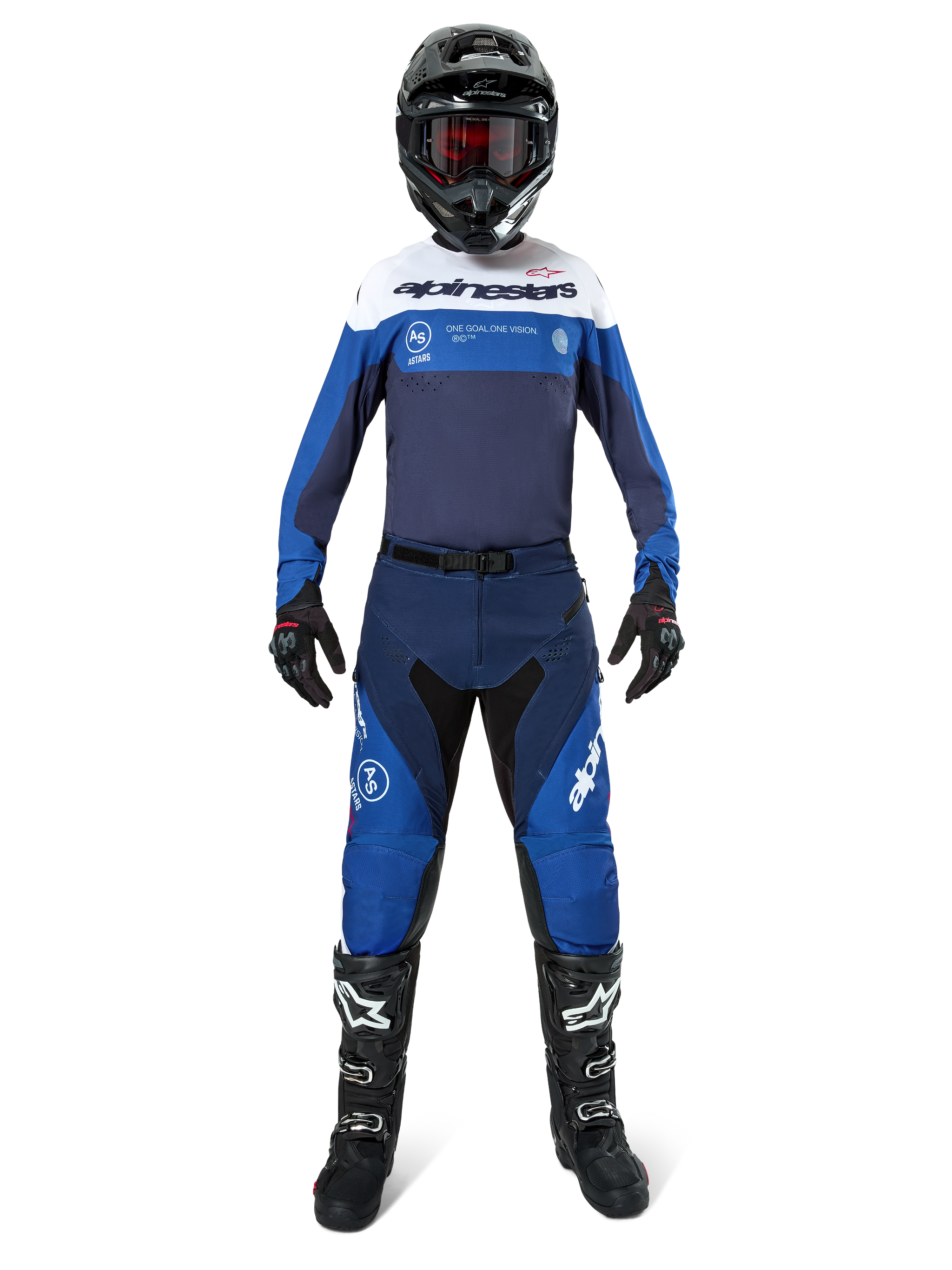 Motocross rider wearing complete racing gear, Pro-Dura Jersey in Navy, Bright Blue and White, matching blue and navy pants, black helmet with red goggles, black and white boots, coordinated outfit for enduro and off-road riding