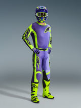 Motocross rider wearing a complete Alpinestars gear set, featuring the 2026 Racer Portl Jersey and matching pants in Purple and Yellow Fluo, coordinated with a matching helmet, goggles, and purple gloves, finished with bright fluo yellow off-road boots, professional racing outfit for motocross performance.