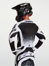 Alpinestars Techstar Swan Jersey, Men's Motocross Jersey, White and Black, Rear View on Model, Performance MX Gear.