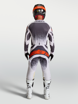 Alpinestars Techstar Swan Jersey and Gear Set, gray and white motocross gear with a red logo, rear on-model view.