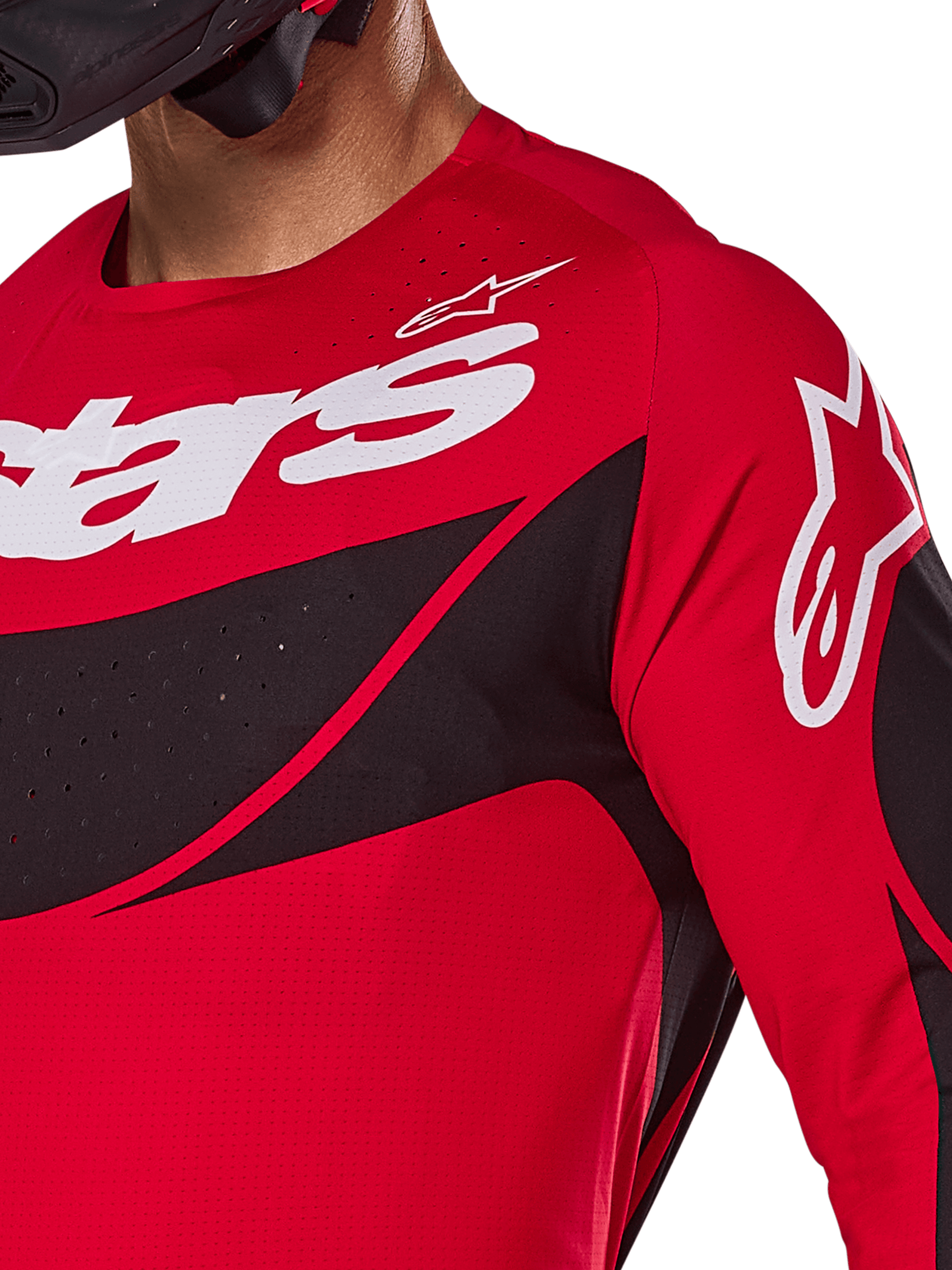 Alpinestars 2025 Techstar Dreem Jersey, Motocross Jersey, Bright Red and Black, close-up view of chest and shoulder featuring white branding, black diagonal panels with laser-cut perforations for ventilation, athletic racing fit for off-road performance.