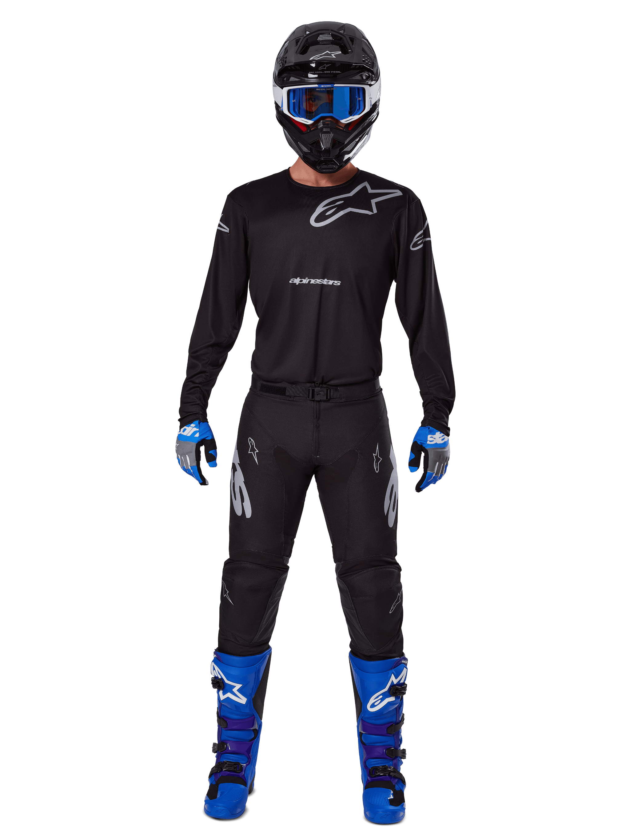 Alpinestars 2025 Racer Graphite Gear Set, Motocross rider wearing complete racing gear, black long-sleeve jersey with gray Alpinestars logos, black pants, black helmet with blue goggles, blue and gray gloves, blue and black boots, coordinated outfit for off-road motocross racing