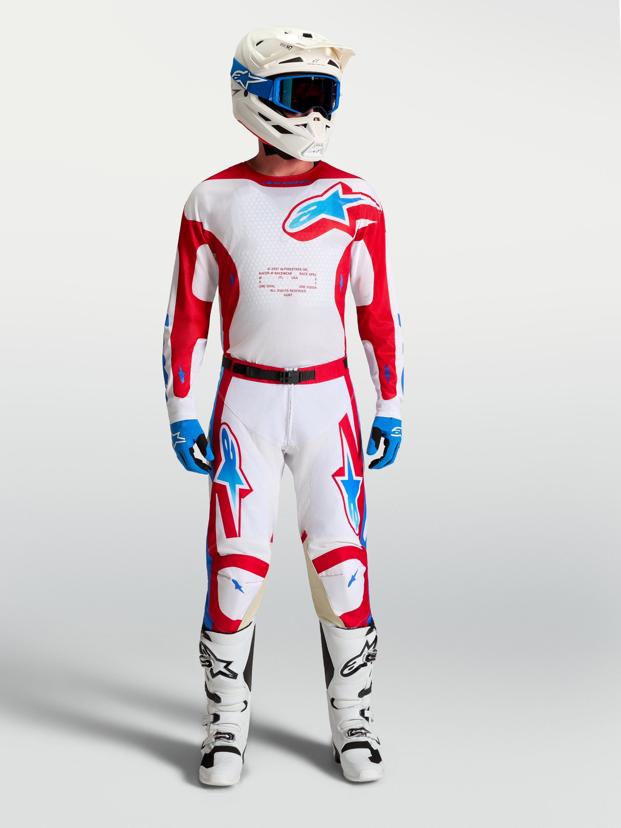 Alpinestars Racer Hunt Jersey, white and red men's motocross gear set with blue accents, matching pants and boots.