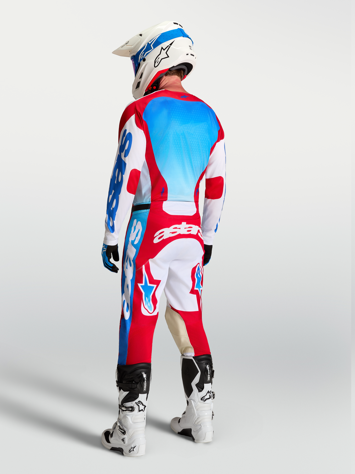 Alpinestars Racer Hunt Pants AND Gear Set, Motocross Racing Gear, Men, Red, White, and UCLA Blue, rear view on rider.