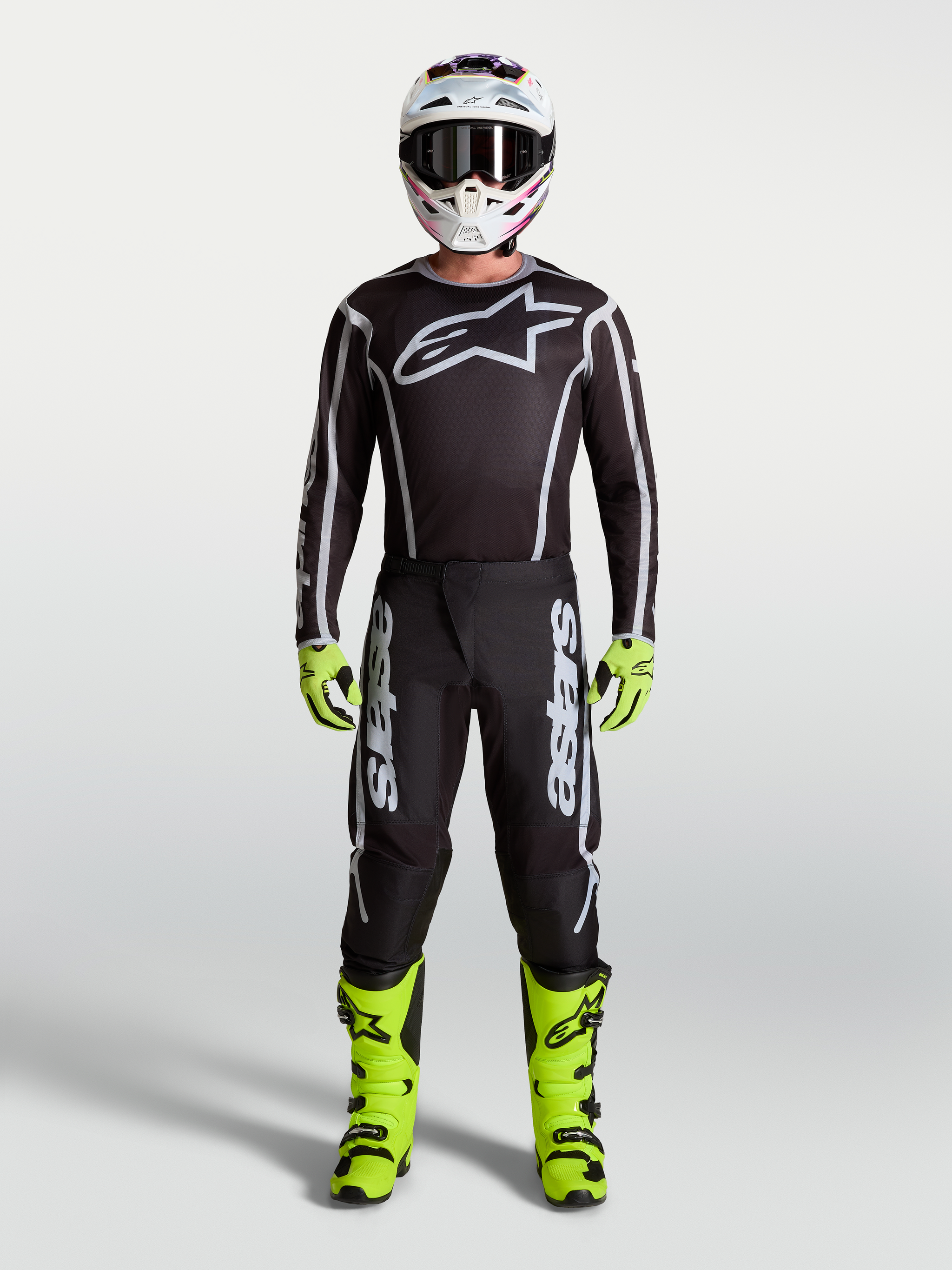 Alpinestars Fluid Apex V2 Jersey AND Fluid Apex V2 Gear Set, Men's Motocross Gear in Black, Silver, and Fluorescent Yellow.