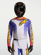Alpinestars Fluid Drag Jersey, Men's Motocross Jersey in Blue Iris and Gold with moisture-wicking fabric.