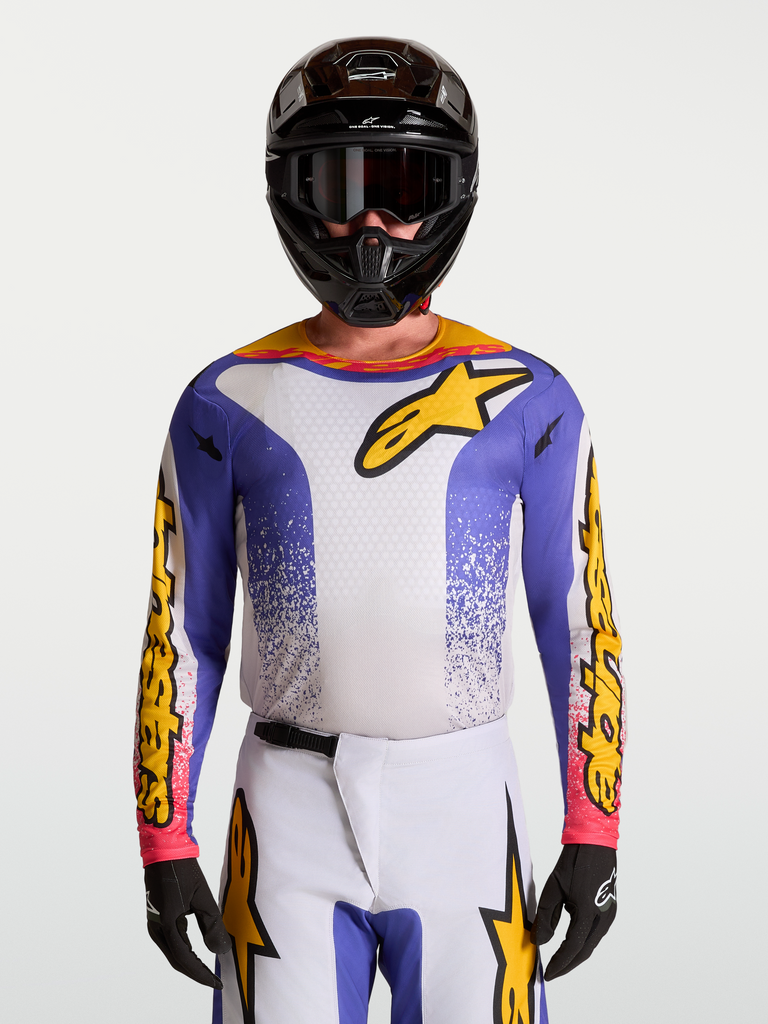Alpinestars Fluid Drag Jersey, Men's Motocross Jersey in Blue Iris and Gold with moisture-wicking fabric.