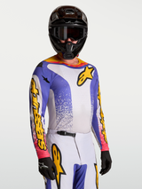 Alpinestars Fluid Drag Jersey, blue and yellow men's motocross jersey with moisture-wicking fabric for off-road performance.