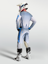 Alpinestars 2027 Racer Amber Jersey, Men's Motocross Gear, Ash Gray and UCLA Blue, rear view on rider with matching pants.