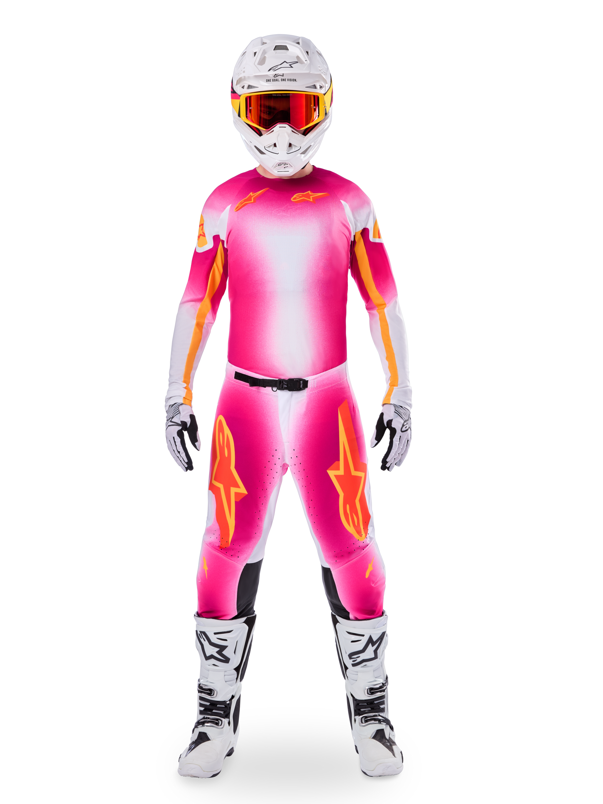 Motocross rider wearing complete racing gear, Limited Edition Supertech AFD MIG Jersey in Pink Fluo and White, matching pants with orange star accents, white helmet with red goggles, white and black boots, coordinated professional motocross outfit