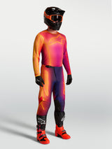 Alpinestars Fluid Kepler Jersey, purple and orange motocross jersey on-model with matching racing gear.