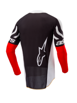 Alpinestars Limited Edition Techstar Deep Jersey, Motocross Jersey, Back View, Black and White with High Red sleeves, large white Alpinestars logo on the back, athletic race fit with perforated poly-fabric