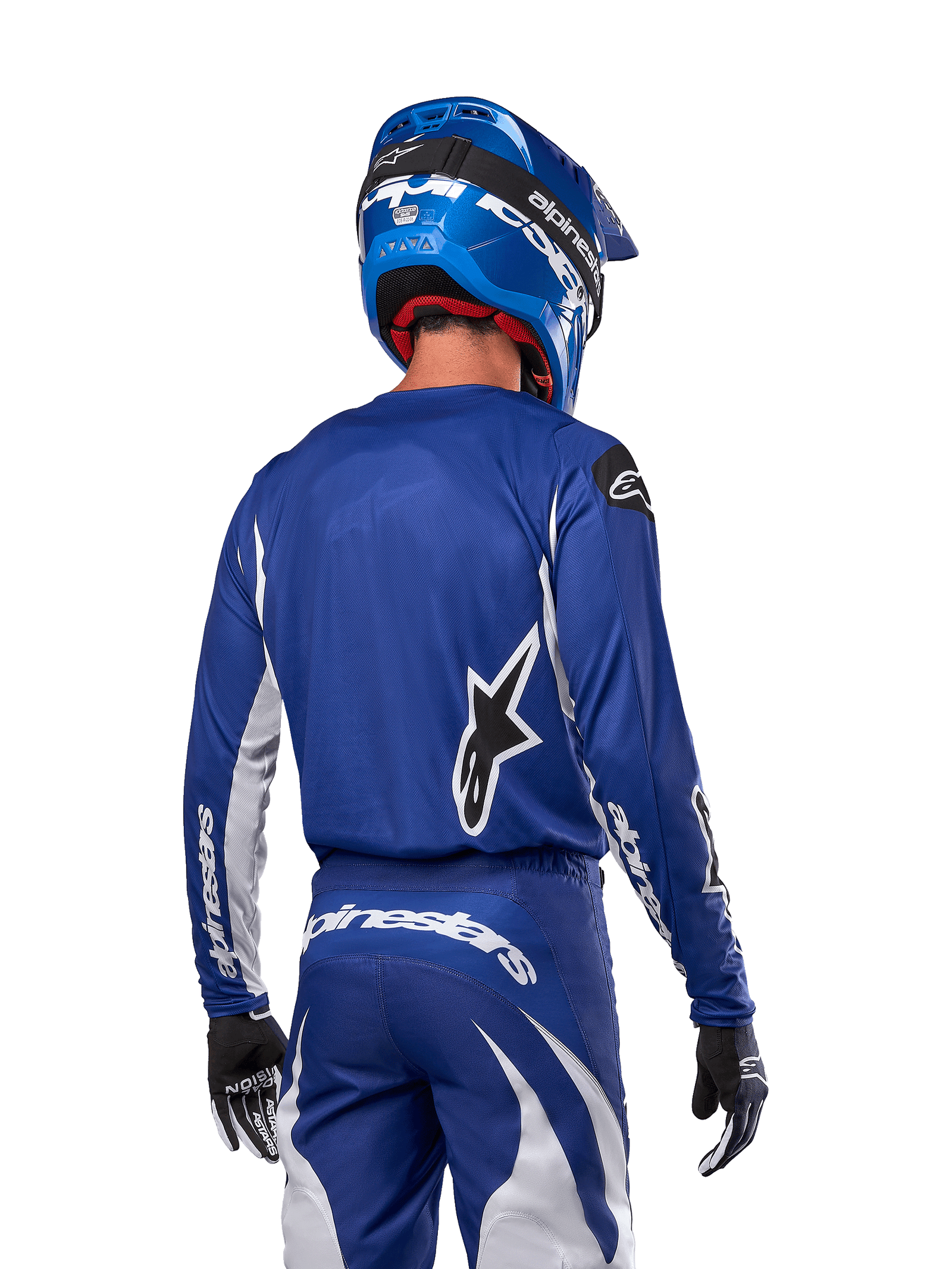 Alpinestars 2024 Fluid Lucent Jersey, Blue and White motocross racing gear, rear view of rider in athletic fit.