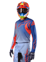 Alpinestars 2024 Fluid Lucent Jersey, Motocross Racing, Man, Blue and Hot Orange, breathable poly-fabric, worn with helmet.