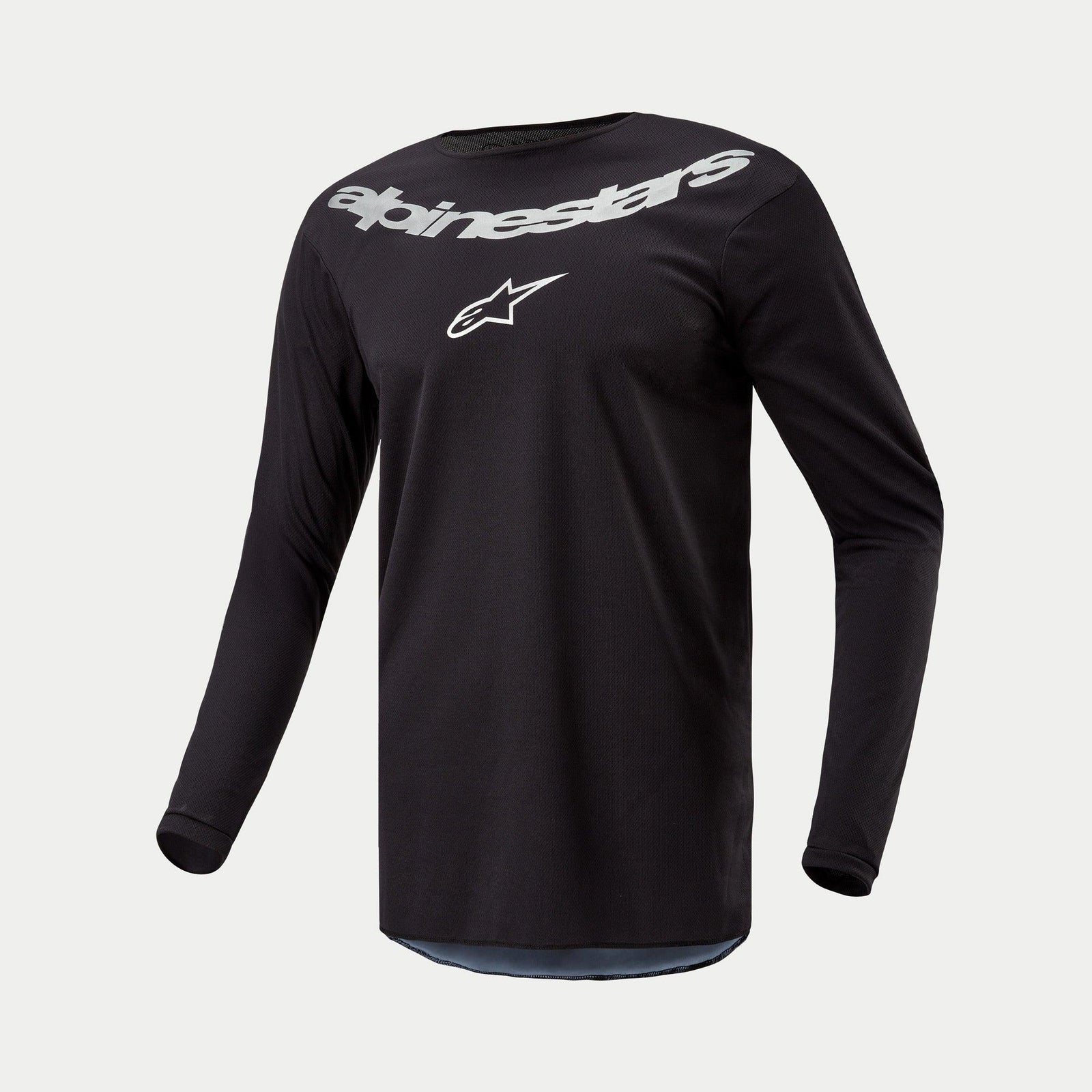 Alpinestars 2024 Fluid Graphite Jersey, Motocross Jersey, Black Silver, long-sleeve performance top featuring large silver Alpinestars branding and star logo on chest, lightweight moisture-wicking poly-fabric for off-road riding
