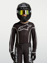 Alpinestars Youth Fluid Apex V2 Jersey, Black and Silver motocross gear, ergonomic athletic fit with moisture-wicking polyfabric.