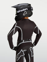 Alpinestars Youth Fluid Apex V2 Jersey, black and silver motocross gear, back view showing the ergonomic athletic cut.