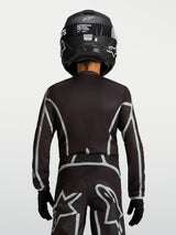Alpinestars Youth Fluid Apex V2 Jersey, Black and Silver motocross top with ergonomic fit and extended rear coverage.