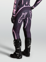 Alpinestars Stella Fluid Apex V2 Pants, Women's Motocross Pants in Graystone and Old Pink, paired with Tech 7 boots.