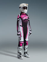Alpinestars 2026 Stella Techstar Nomur Gear Set, full women's motocross racing gear, vibrant pink black and white jersey with matching pants, white helmet and goggles, white and black boots, professional coordinated motocross outfit