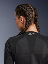 Alpinestars Woman Stella Troop-Air Jacket, Black, detailed rear view of upper back and neck, woman with French braided hair, featuring a white Astars logo on the collar and lightweight 2D tech mesh fabric for ventilation