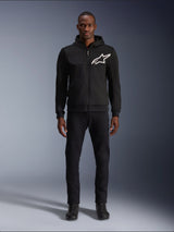Alpinestars Chrome V2 Sport Hoodie, black men's urban riding jacket with a white logo and tech fleece, worn by a model.
