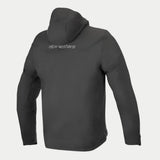 Alpinestars Domino Tech Jacket, urban softshell motorcycle hoodie in Black, featuring a fixed hood and reflective rear logo.