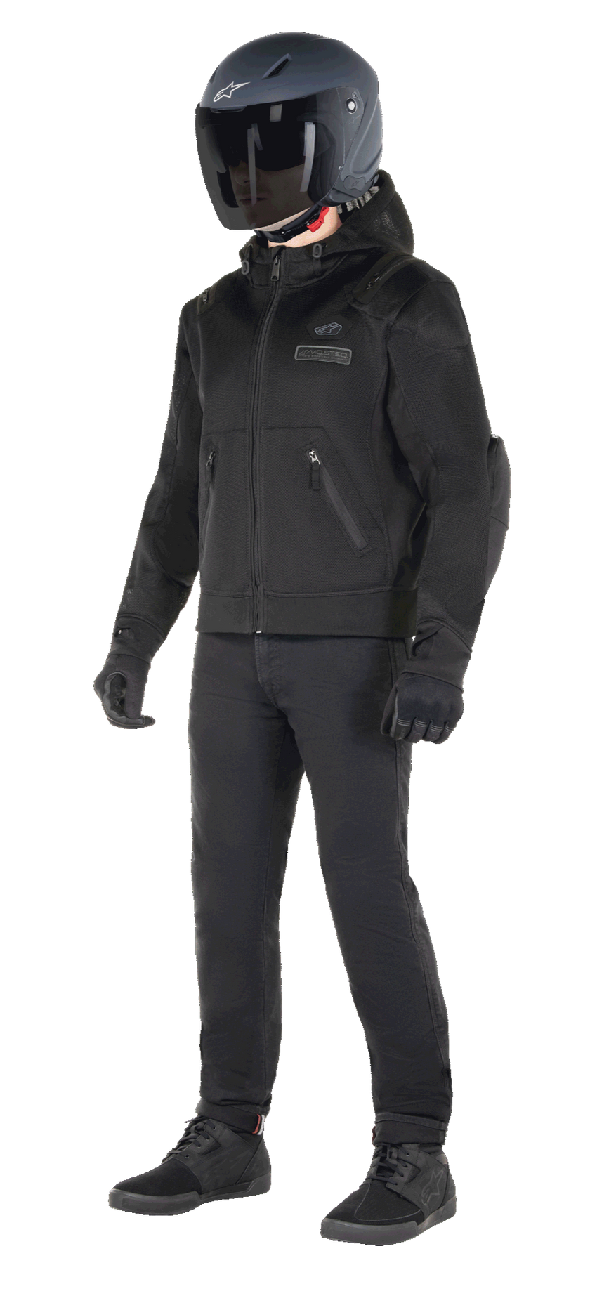Alpinestars Moflow Air Tech Hoodie, Urban Motorcycle Hoodie, Black Black, worn by a rider with a matte black helmet, black gloves, and riding pants, featuring a full mesh construction for airflow, zippered pockets, and subtle chest logos, sleek casual design for warm weather street riding.