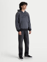Alpinestars Ageless Hoodie, men's urban motorcycle hoodie in asphalt melange gray, front view on a model wearing casual riding apparel with CE certified shoulder and elbow armor