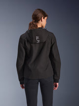 Alpinestars Stella Radium Tech Hoodie, Women's urban motorcycle hoodie in Black, rear view showing hood with vertical silver Alpinestars branding, lightweight 3-layer windproof shell, modern athletic fit