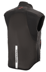Alpinestars HT Heat Tech Vest, Black, Rear view featuring a red Astars logo on the upper back and a vertical reflective white strip with Alpinestars branding on the lower back, motorcycle heated base layer