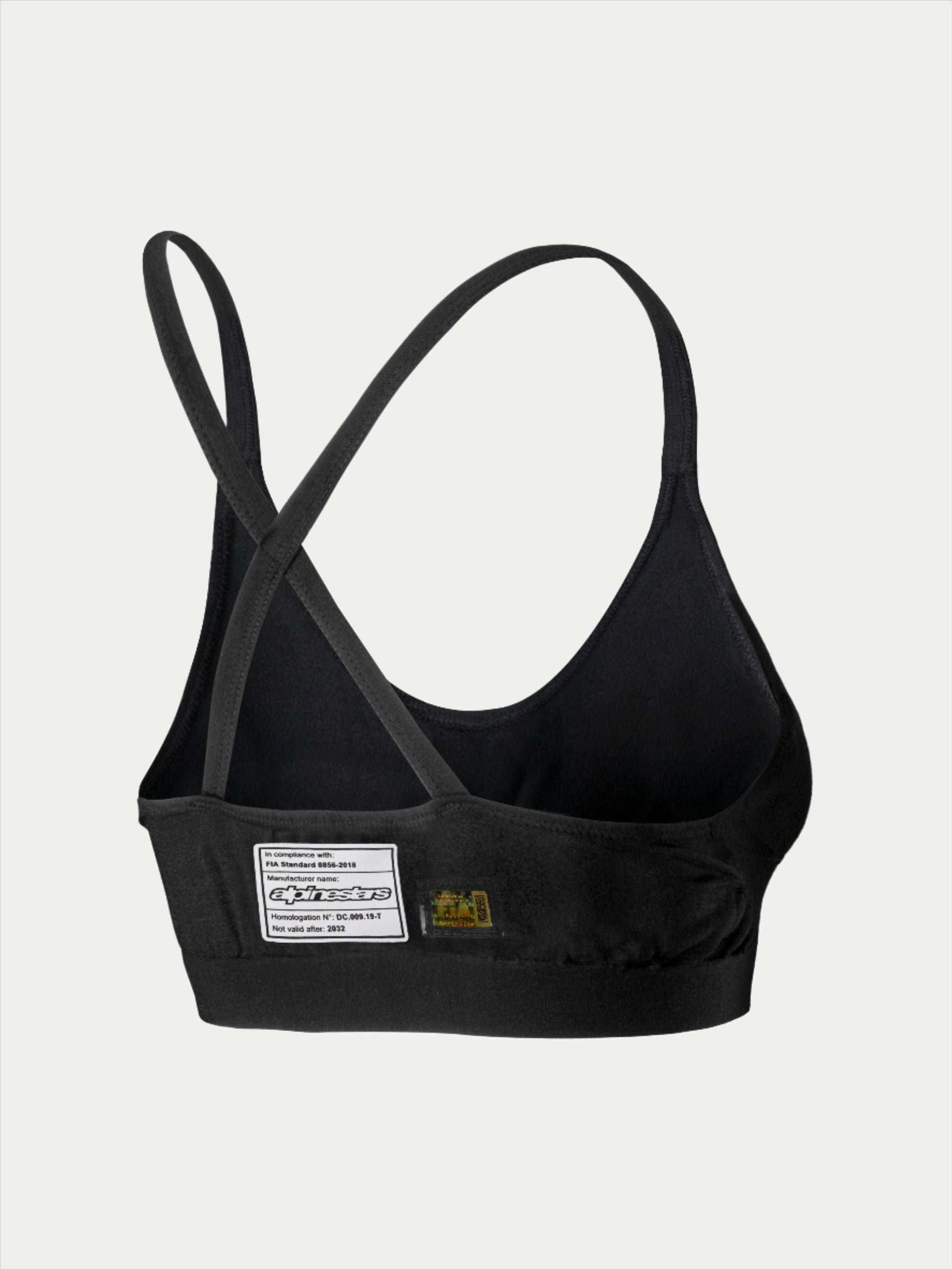 Alpinestars Stella TECH ZX Bra, Auto Racing Base Layer, Black, back view featuring FIA 8856-2018 certification label, thin crossed straps, lightweight flame-resistant material for motorsport protection.