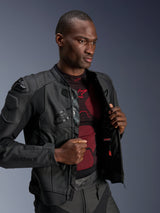 Alpinestars Dusk Airflow Leather Jacket, Black Black, worn by a male model over a red and black base layer, featuring perforated leather panels, external DFS shoulder sliders, and a performance sport fit.